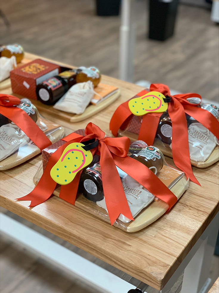 bow around cutting board and gifts