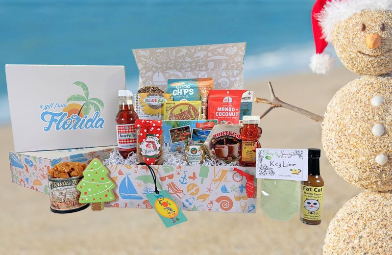 A large sized holiday gift box with Florida vibes! Send a variety of tasty, seasonal, Florida-inspired treats